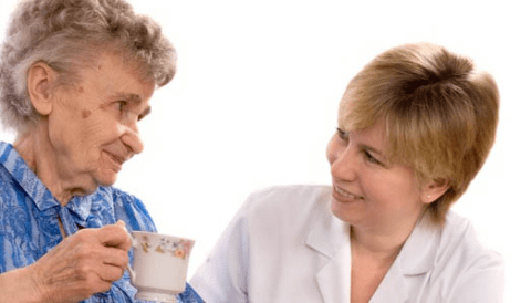 Nurse with elderly woman